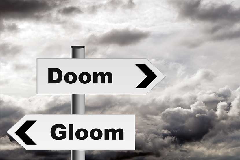 Doom and gloom signs against a stormy background
