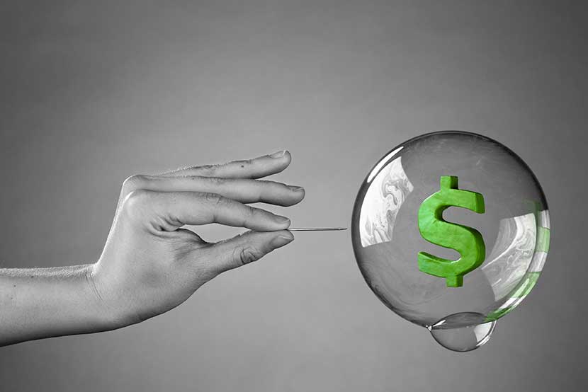 bubble-pop Dollar sign floating in bubble, about to be popped with a needle
