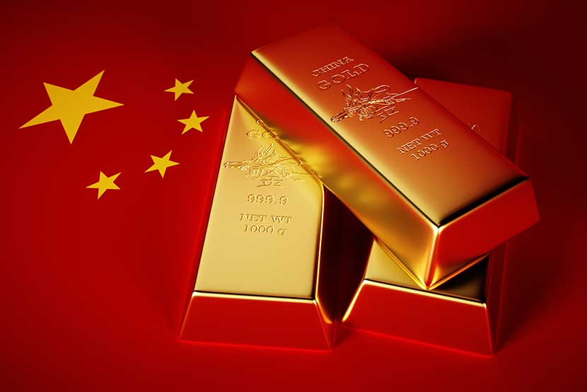 china-gold Three 1000 gram gold bars and Chinese flag