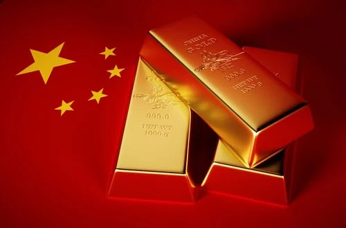 Three gold bars atop a Chinese flag