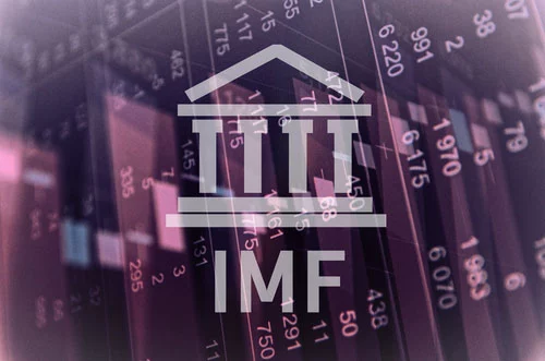 International Monetary Fund logo against purple backdrop of cascading stock market prices