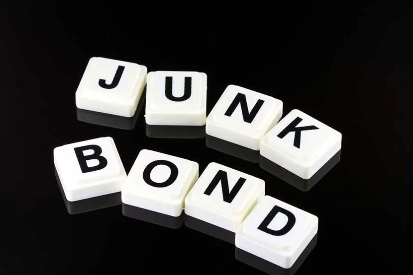 Junk bond spelled out in Scrabble letters