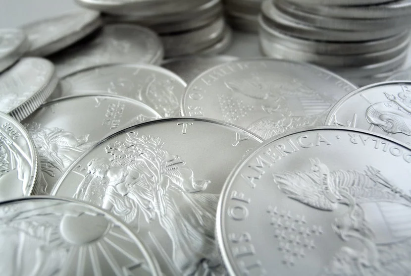 Silver American Eagle Coins, both front and backs displayed