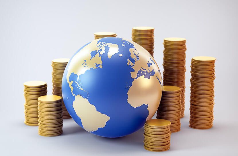 why-central-banks-buy-gold Gold and blue globe surrounded by piles of gold coins