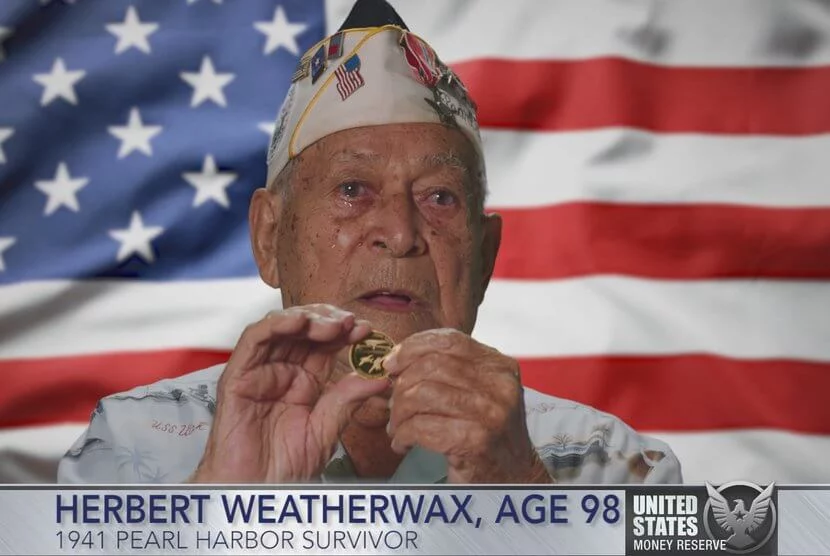 Herbert Weatherwax, 1941 Pearl Harbor Survivor holding 24-karat Pearl Harbor Gold Coin