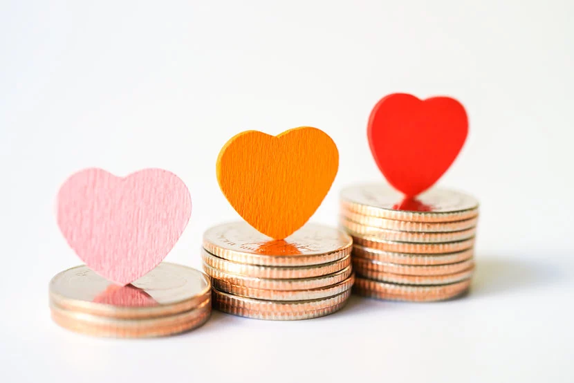 best-gold-silver-coin-gift-ideas Stacks of gold and silver coin gifts, with various felt hearts sitting on top