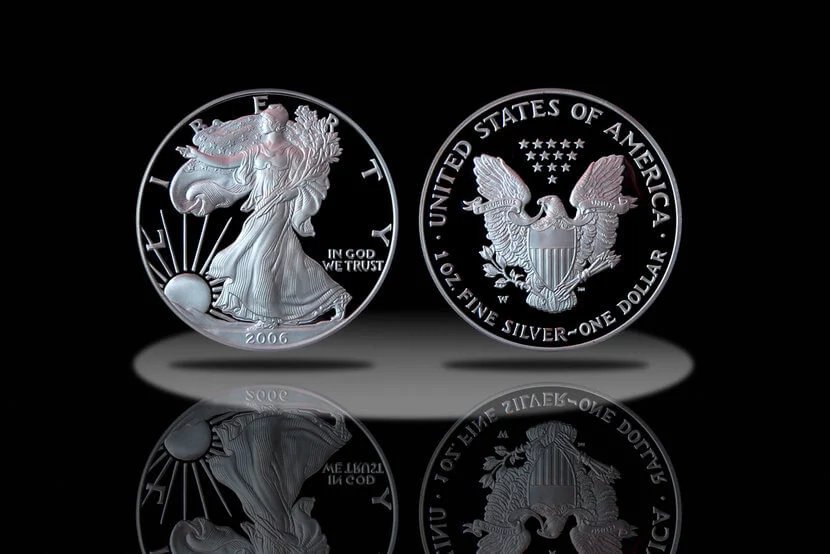 Proof American Silver Eagle Coin spotlighted on black