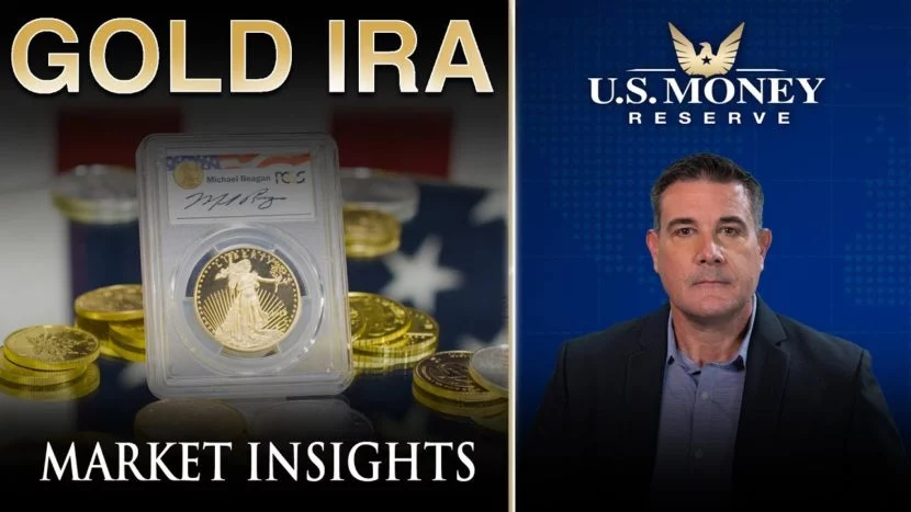 enduring quantitative easing coy wells presenting next to a gold coin in its protective case about quantitative easing
