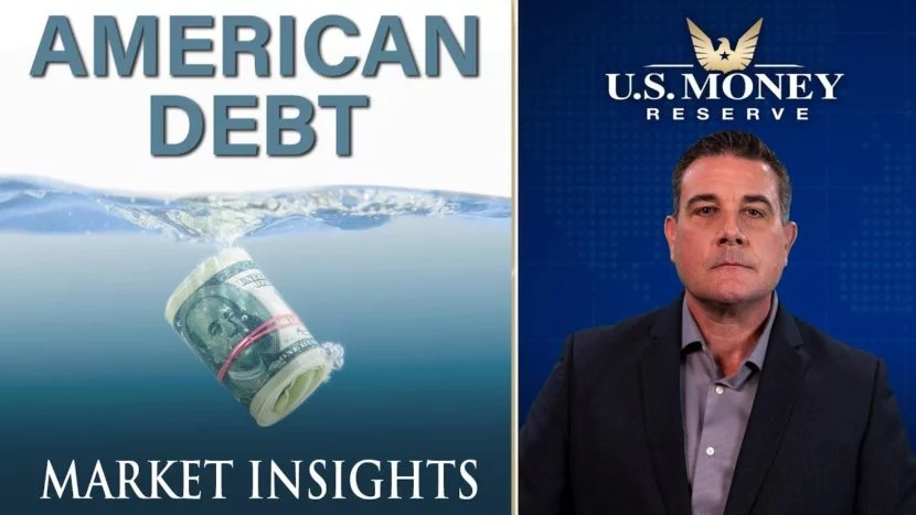 coy wells presenting next to american dollar bills in a roll drowning in a sea of debt