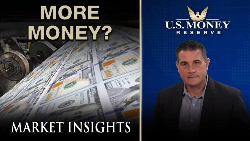 coy wells presenting next to money being printed