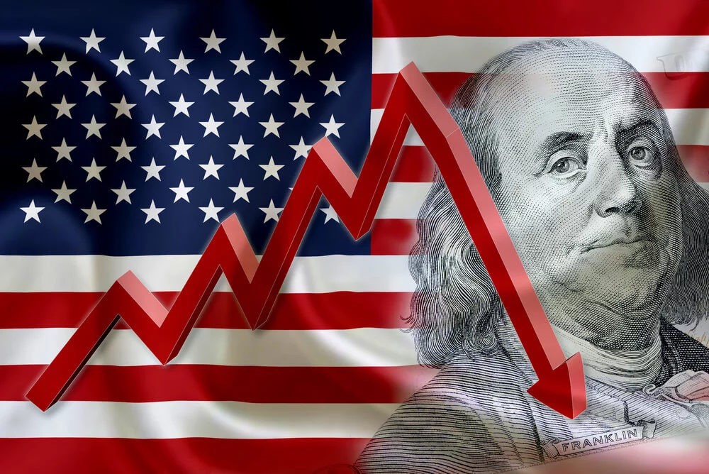 Flag of the United States of America with the face of Benjamin Franklin on US dollar 100 bill and a red arrow indicates the stock market enter recession period
