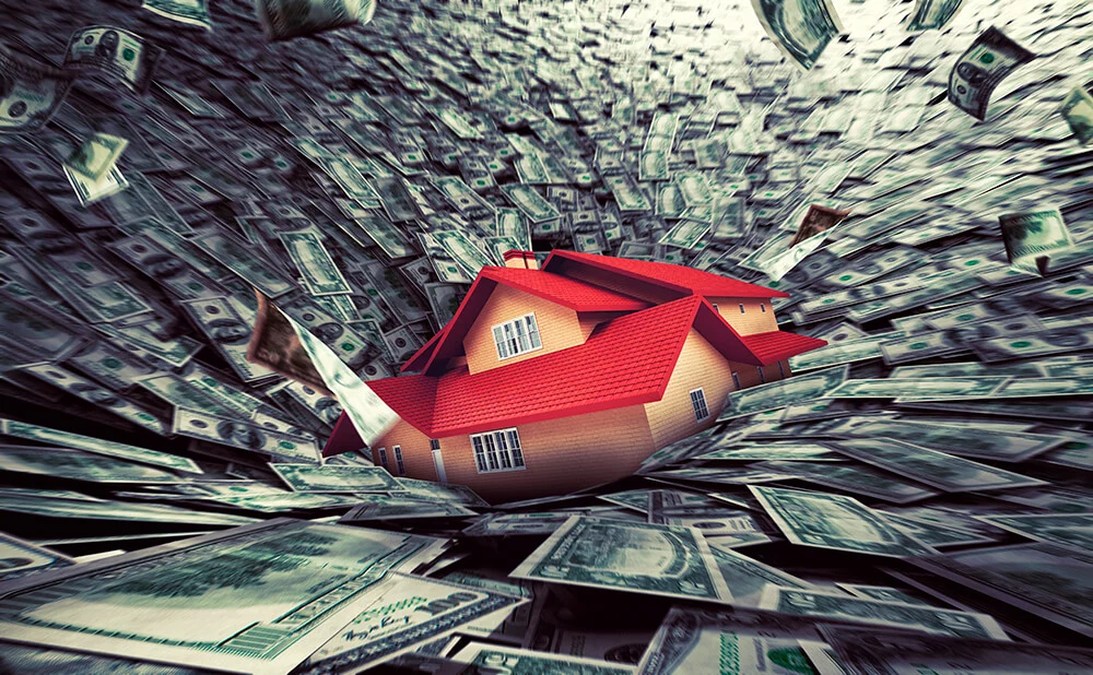House in the middle of a vortex of dollar bills