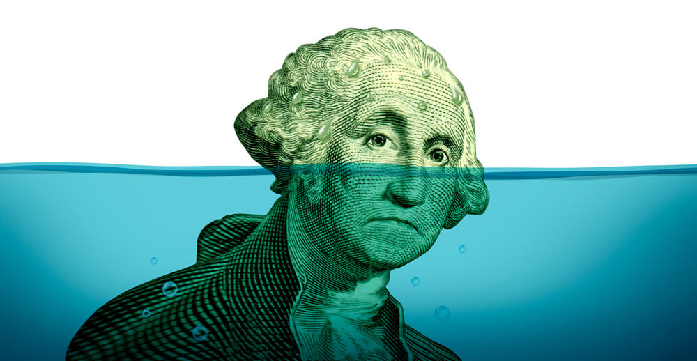 George Washington from dollar bill with unhappy look half submerged under water