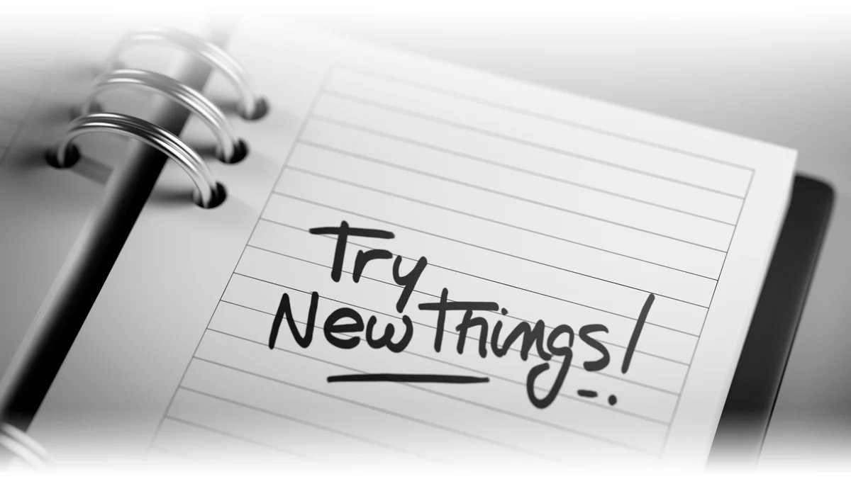 20771629303548843 Try New Things Written on Notebook