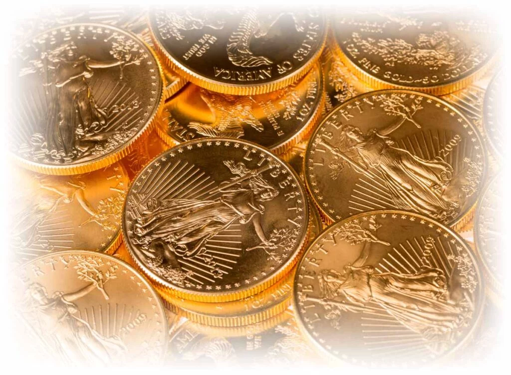 Close-up of pile of Gold American Eagles