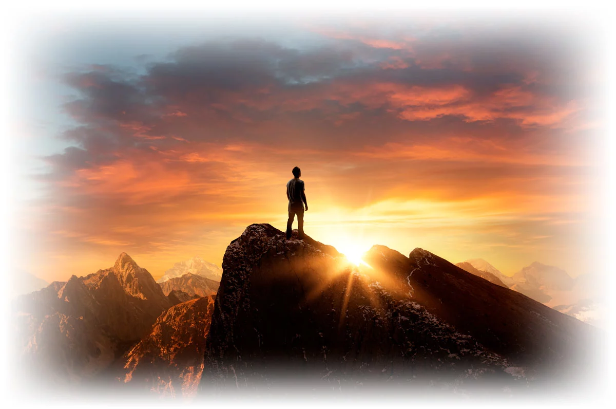 Man standing on mountaintop