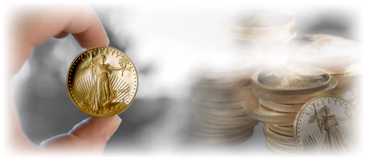 Man hand holding American Gold Eagle coin