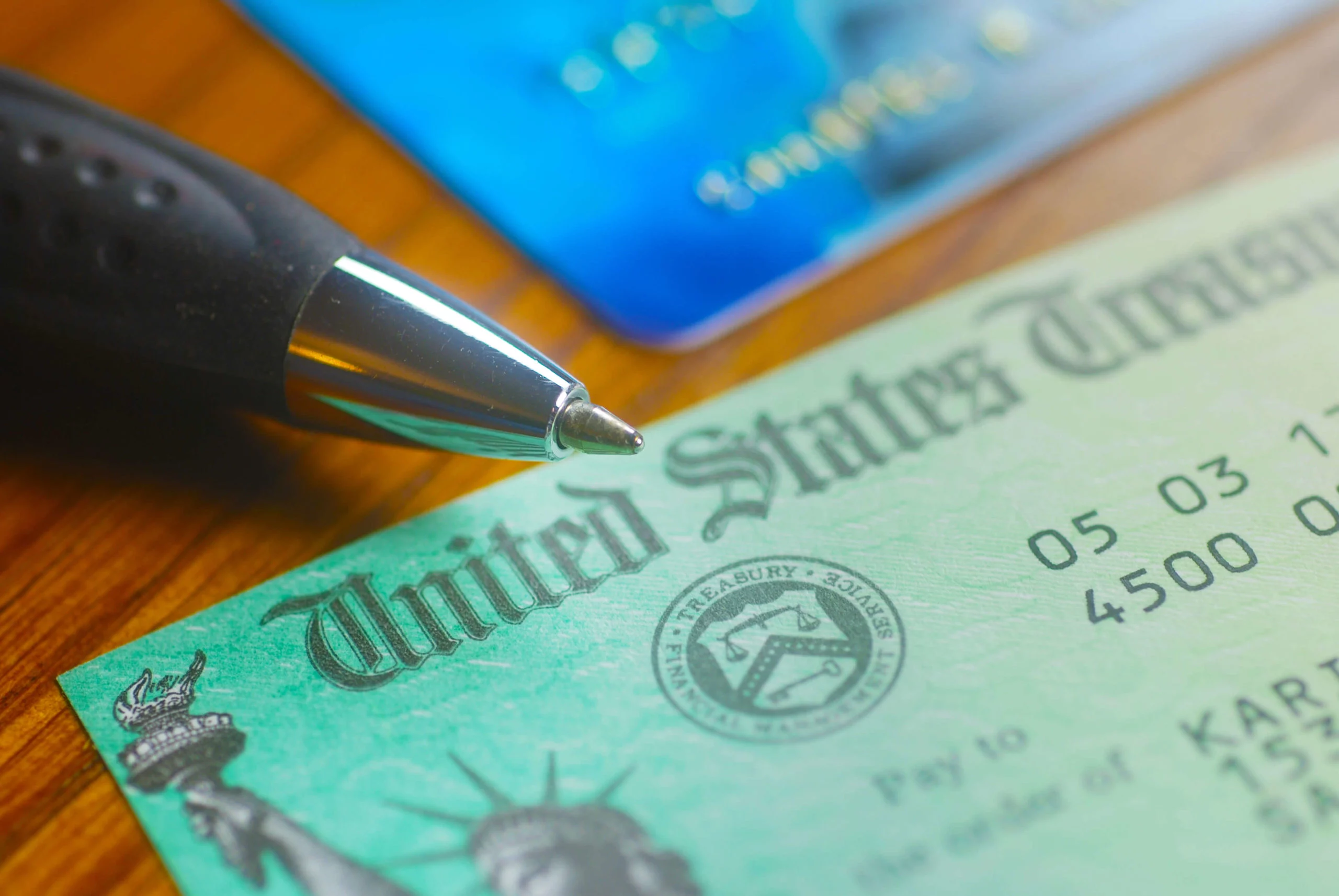 shutterstock_276502565 (1) Pen resting by Social Security check