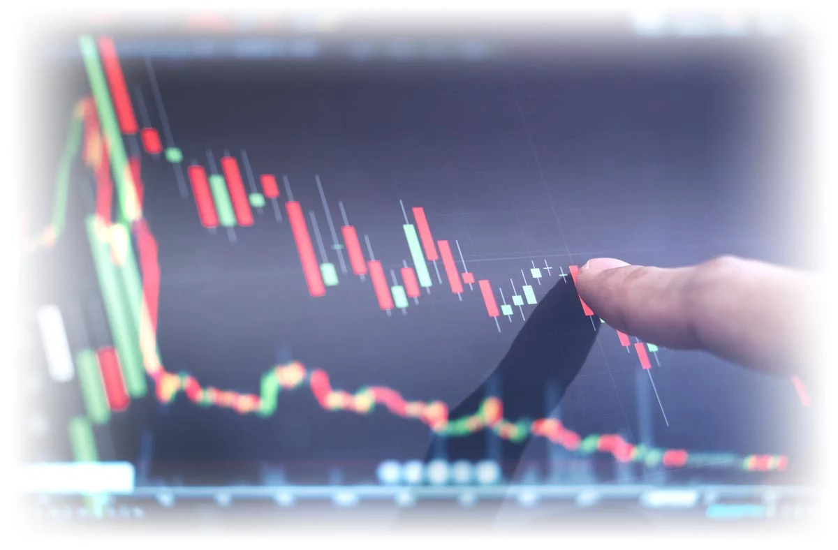 Finger pointing at screen showing negative market activity