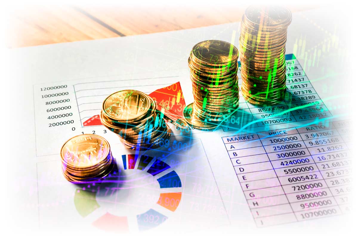 Gold coins and portfolio performance data over printout of market information and pie chart