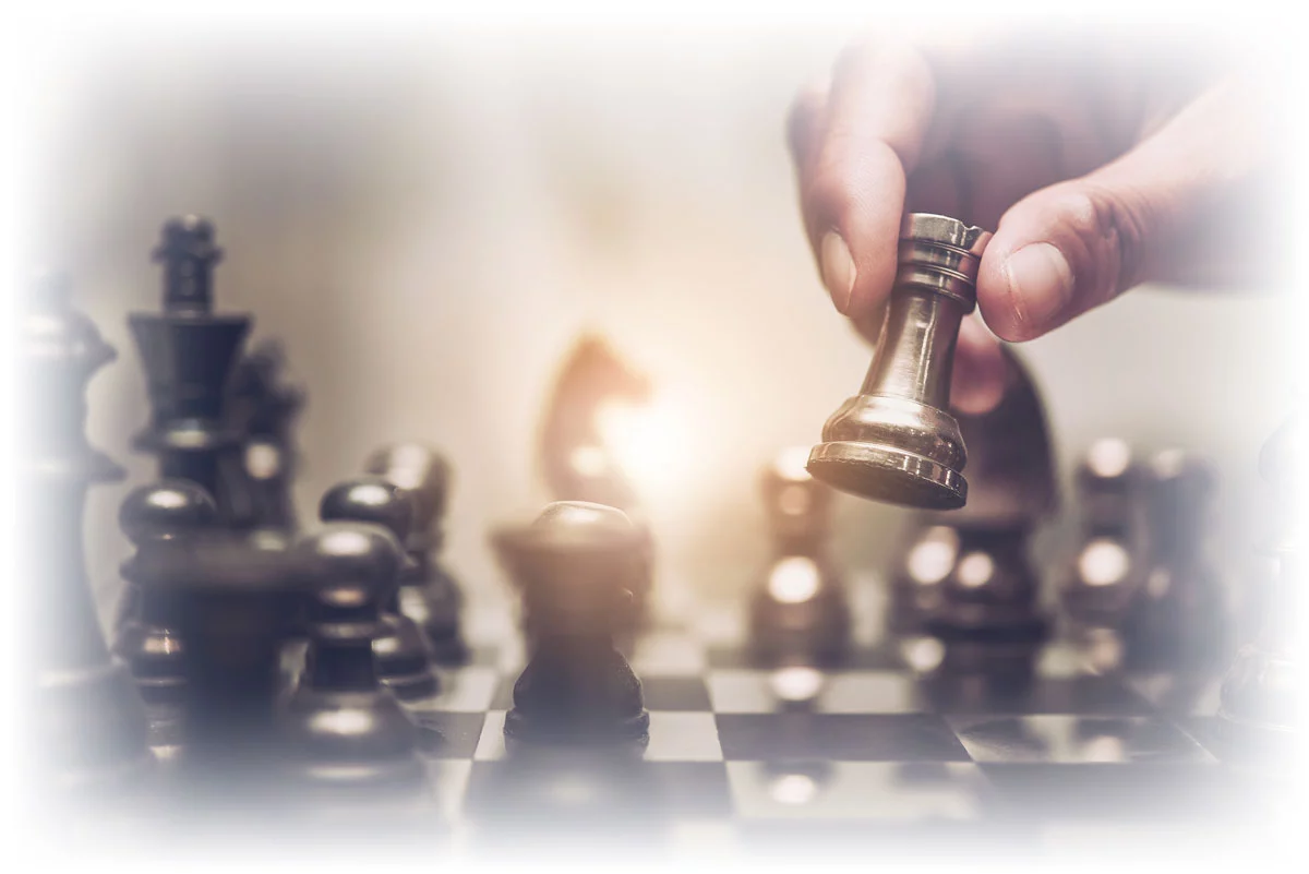 Hand moving chess piece