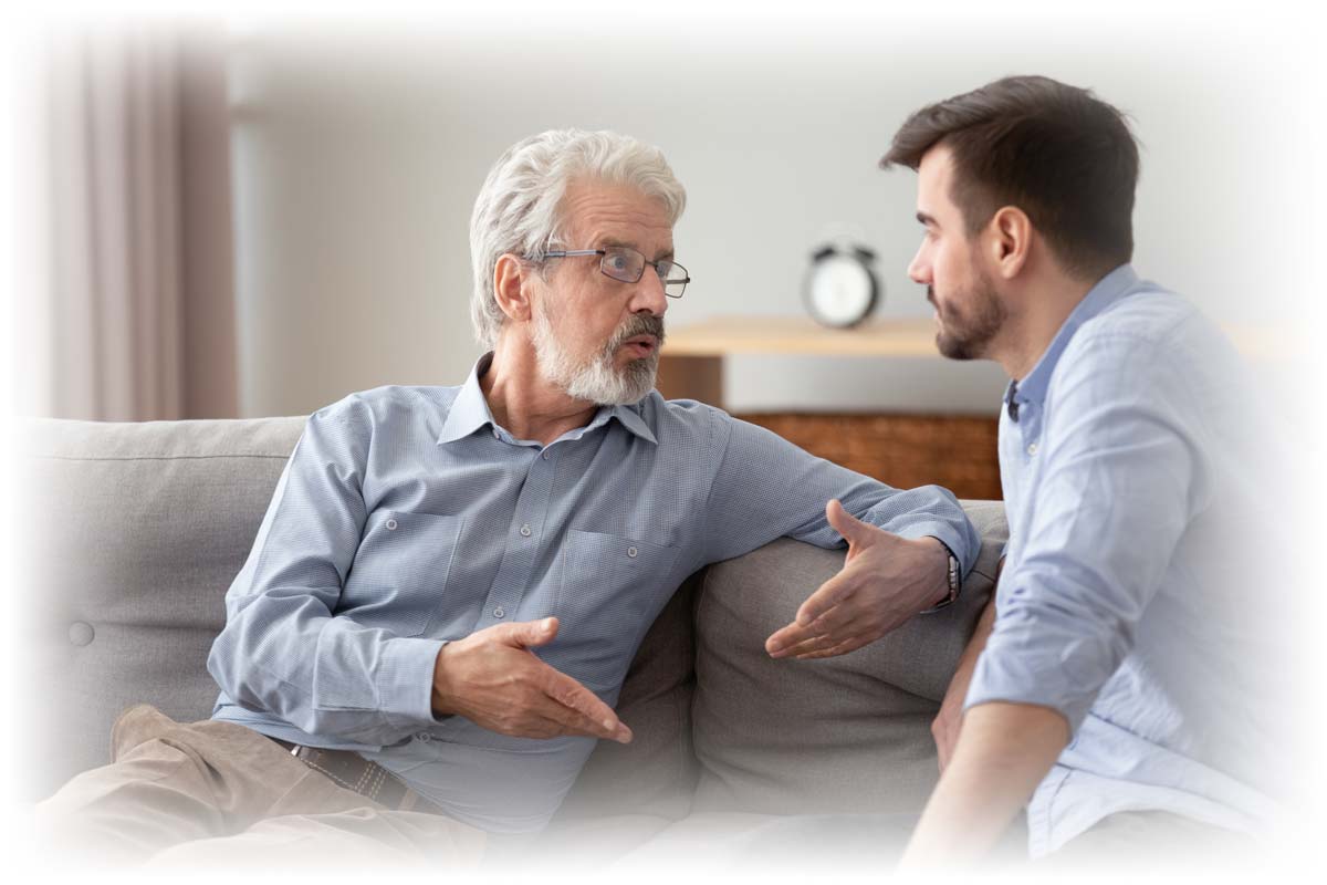 Older man talking with son
