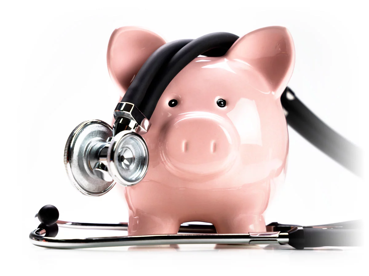 Stethoscope and piggy bank