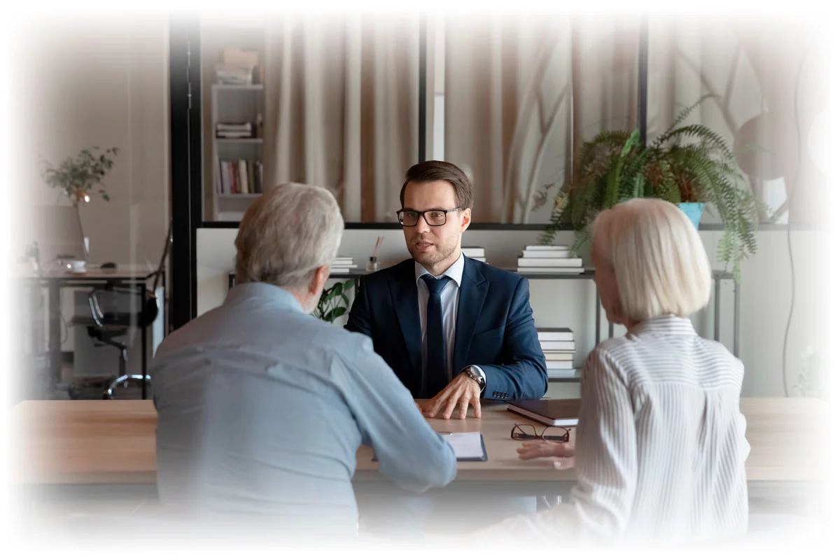 Couple talking to financial advisor