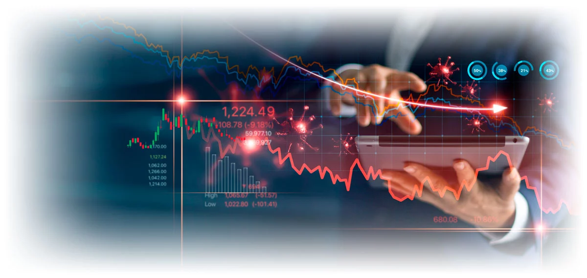 Downward-trending data chart over man holding tablet
