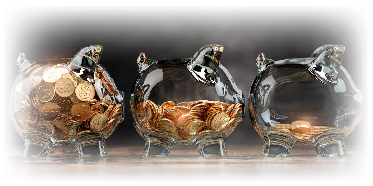 Three piggy banks with progressively less money inside