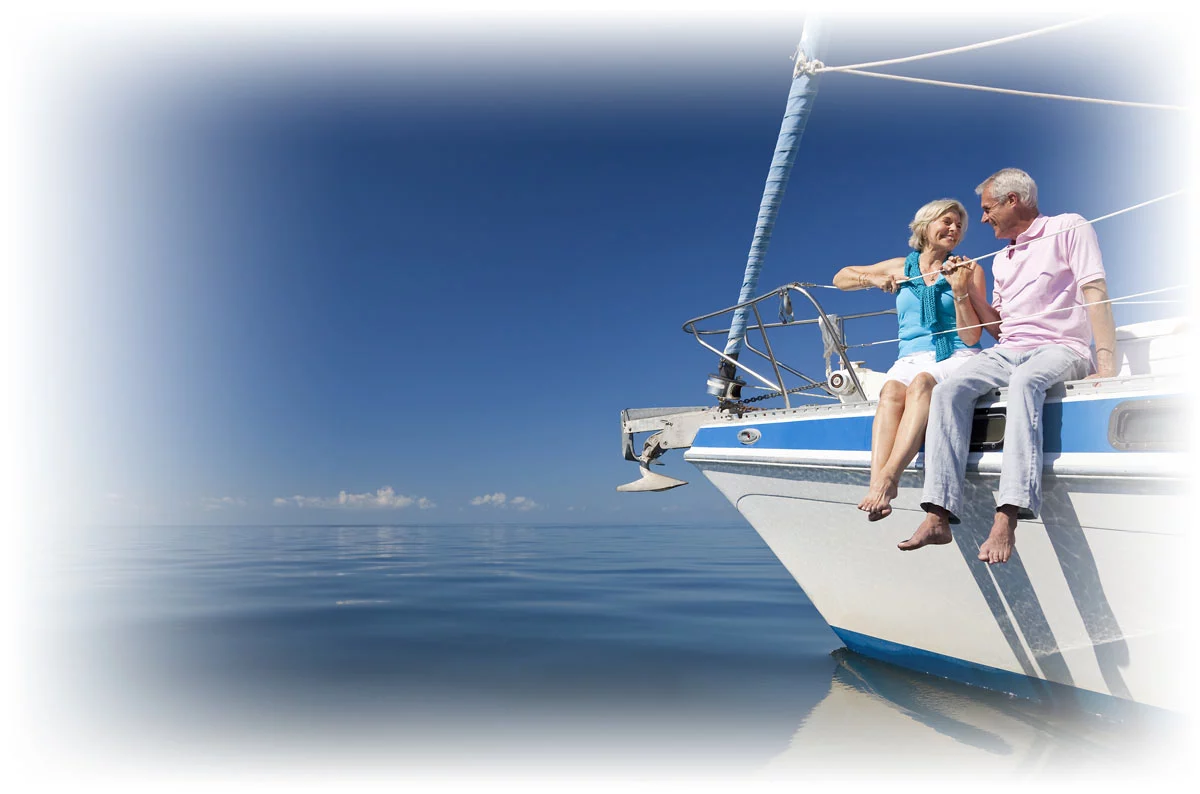 Retired couple sitting together on boat Retired couple sitting together on boat