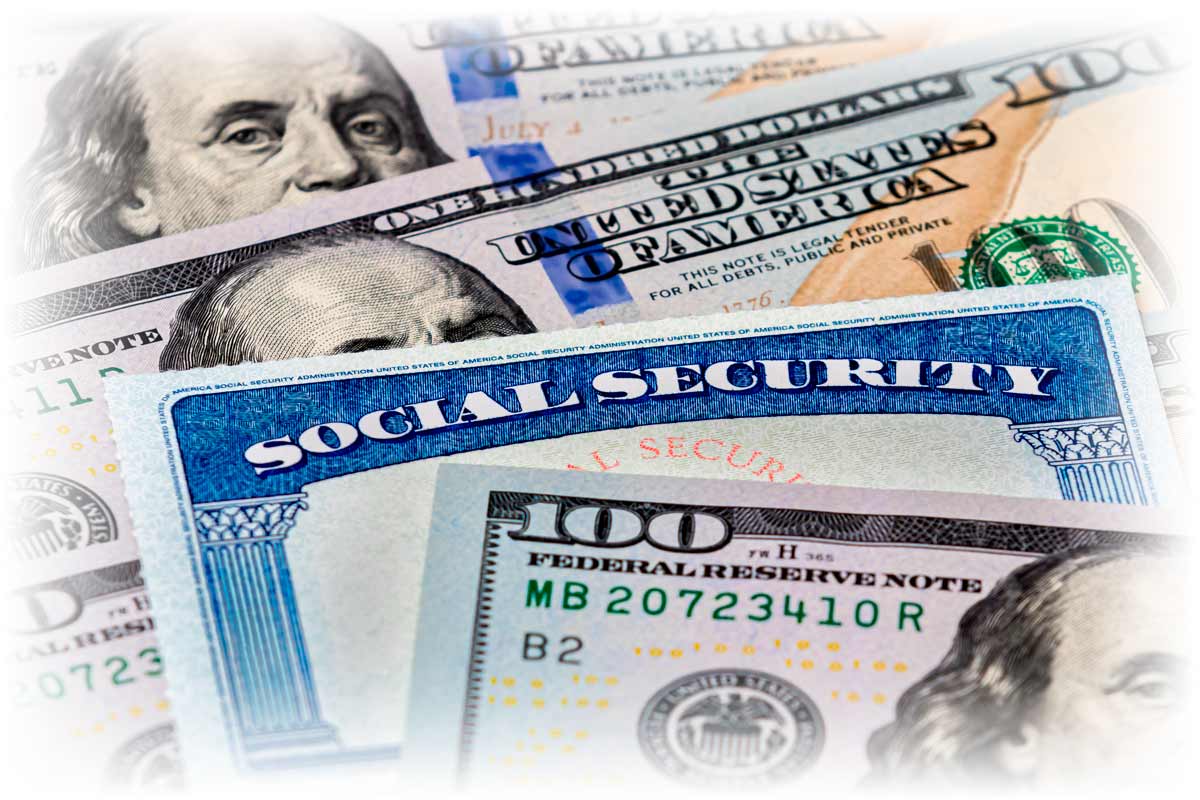 Social-Security-card-and-$100-notes_1200px Close-up of Social Security card and $100 notes