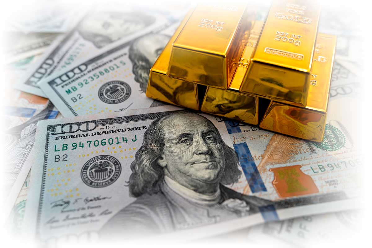 Stack of gold bars over $100 notes