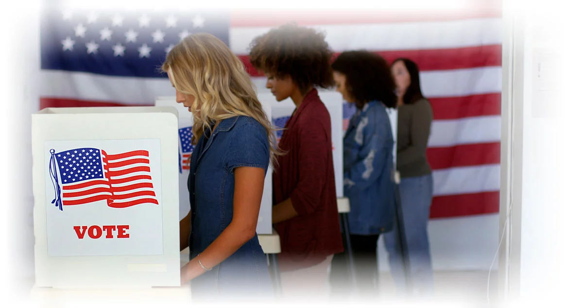 Voters filling out ballots behind privacy screens