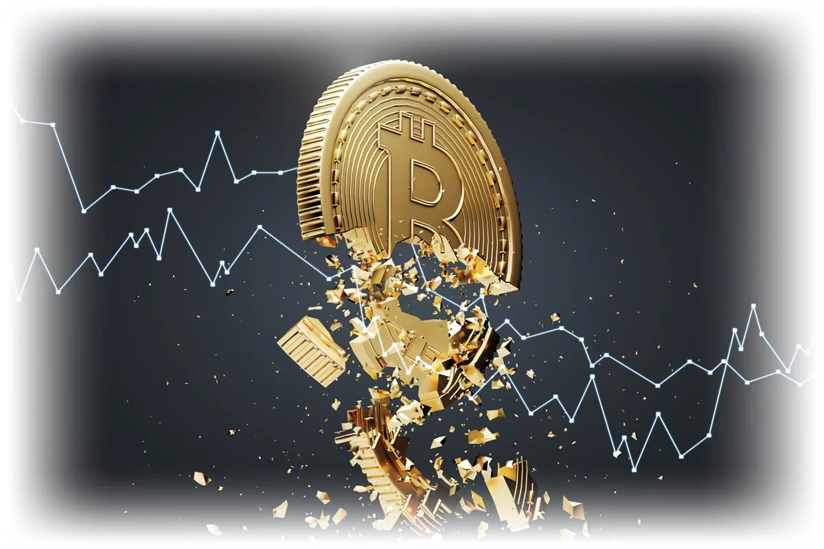 Coin representing Bitcoin shattering in front of negative-trending data chart