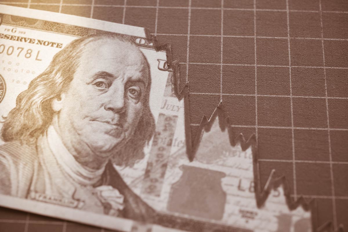 Dollar torn along downward-trending chart line