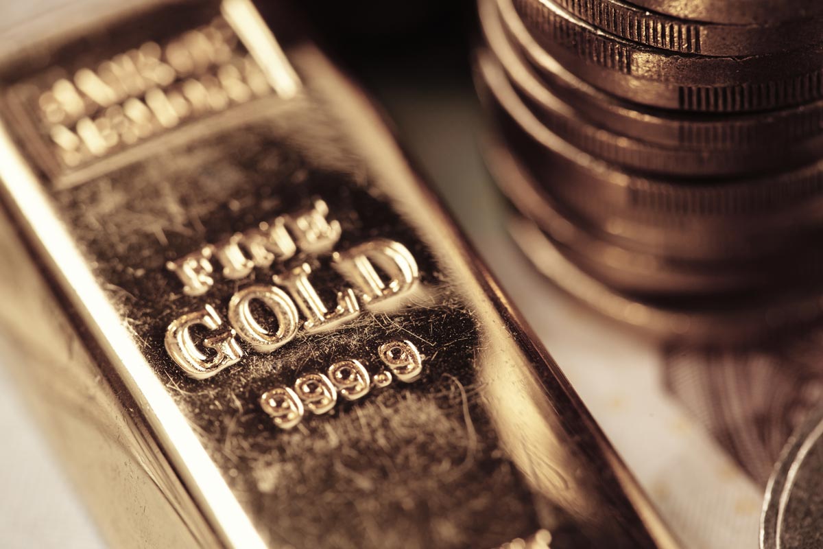 Gold bar and coins
