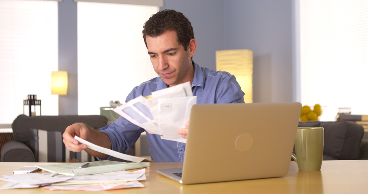 Man going over bills and finances