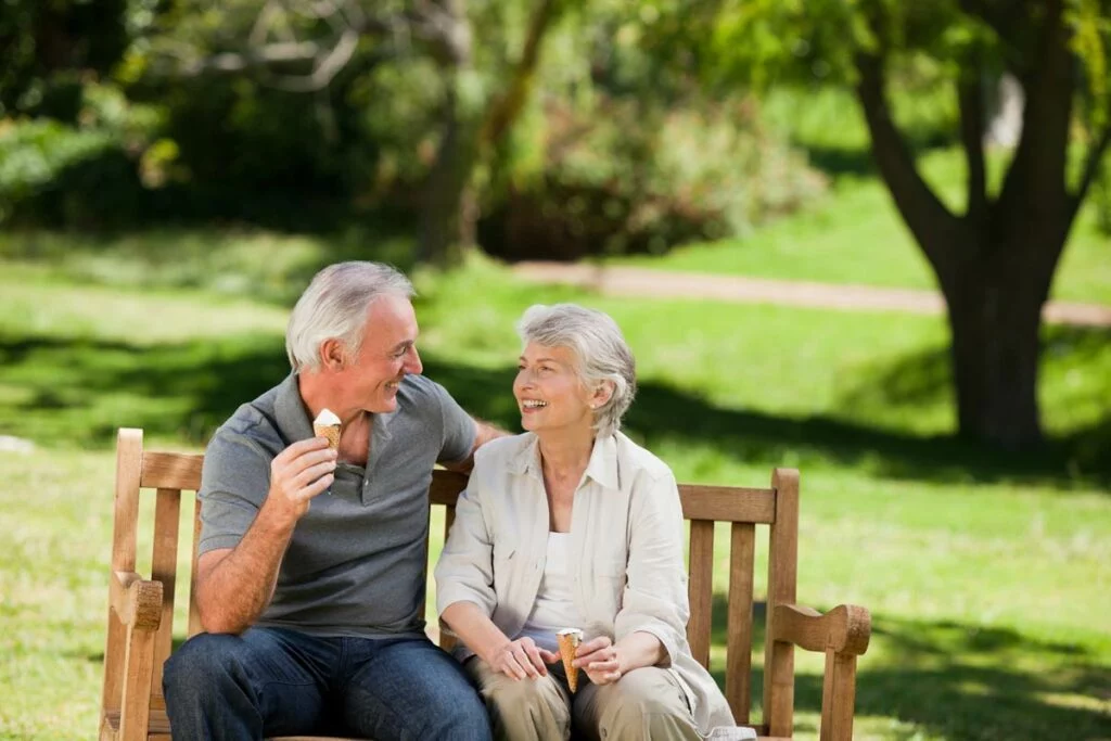 Senior couple eating ice cream