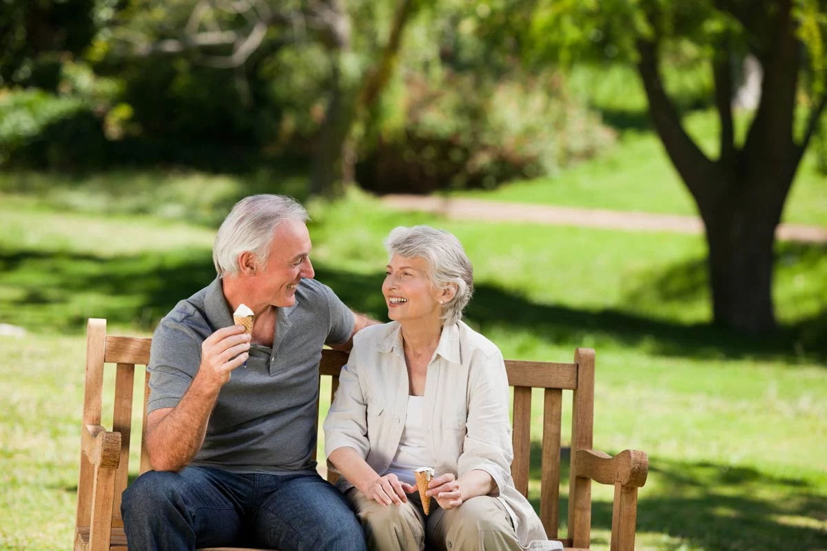 Senior couple eating ice cream