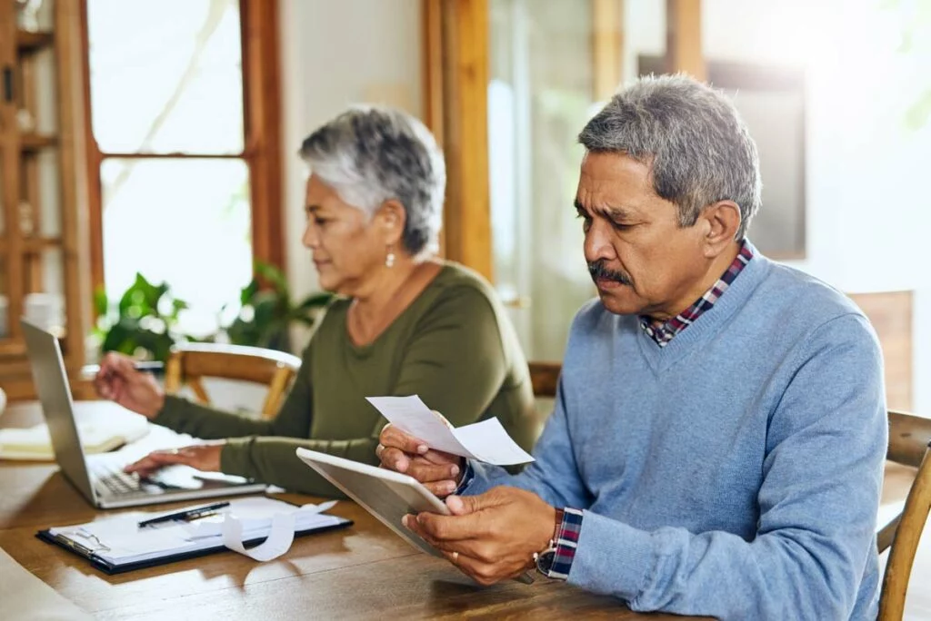 Older couple creating budget