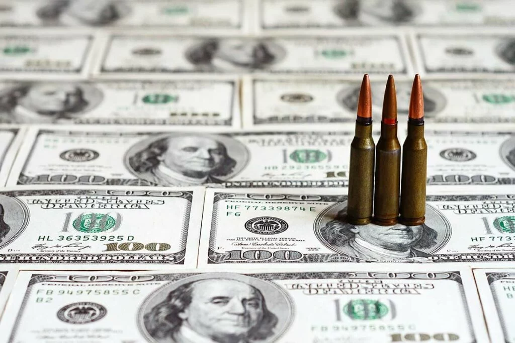 Bullets on $100 notes