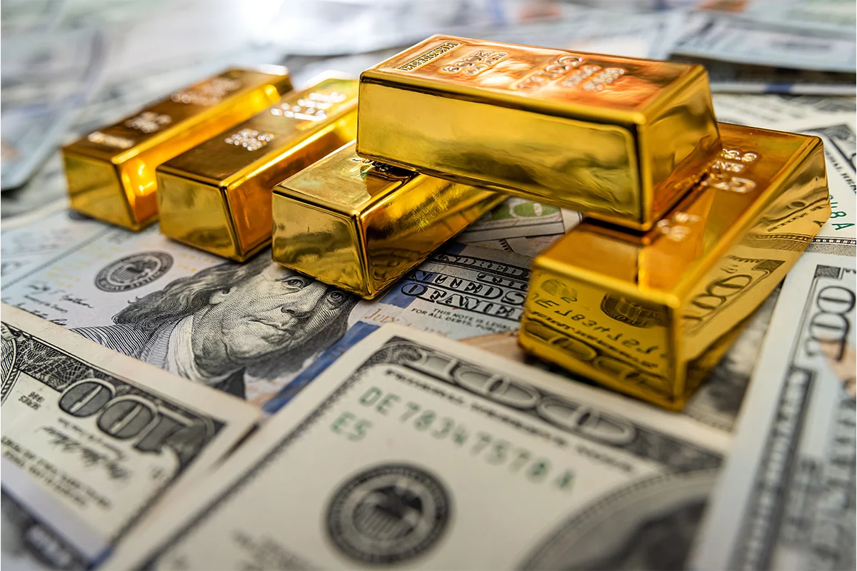 Gold-Bars-on-Dollars