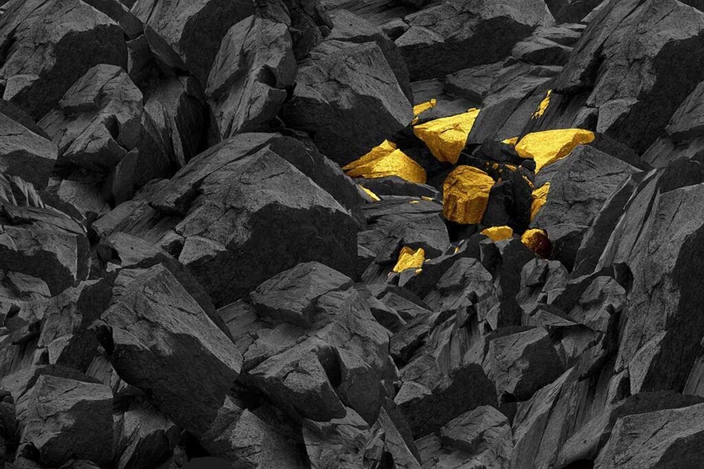 Gold nuggets among mined materials