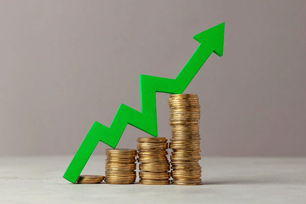 Green-arrow-above-gold-coins _1200px
