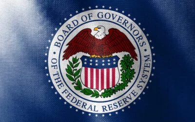 Fed warns of risks, rates remain unchanged