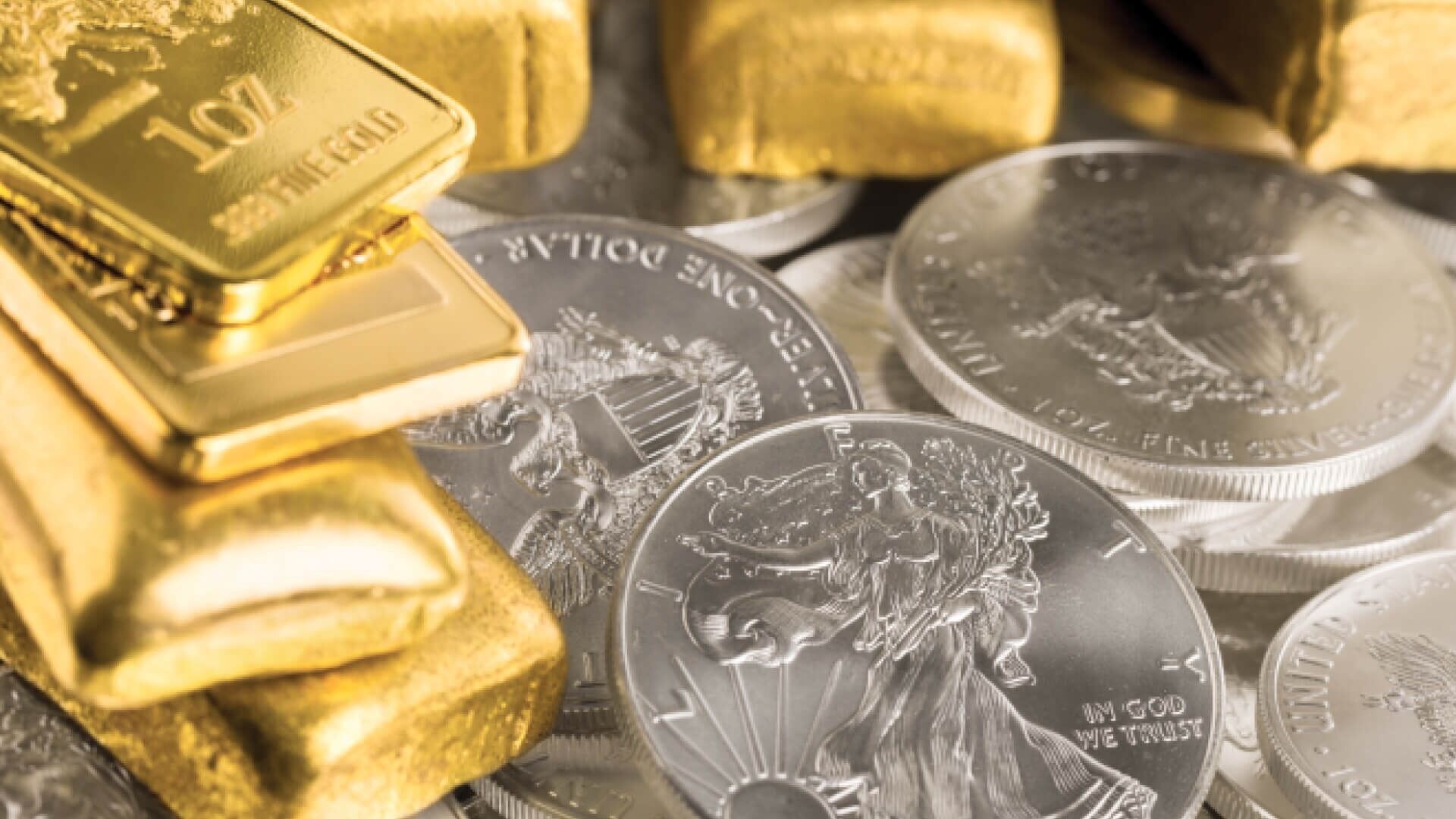 Gold bars and silver coins Gold bars and silver coins