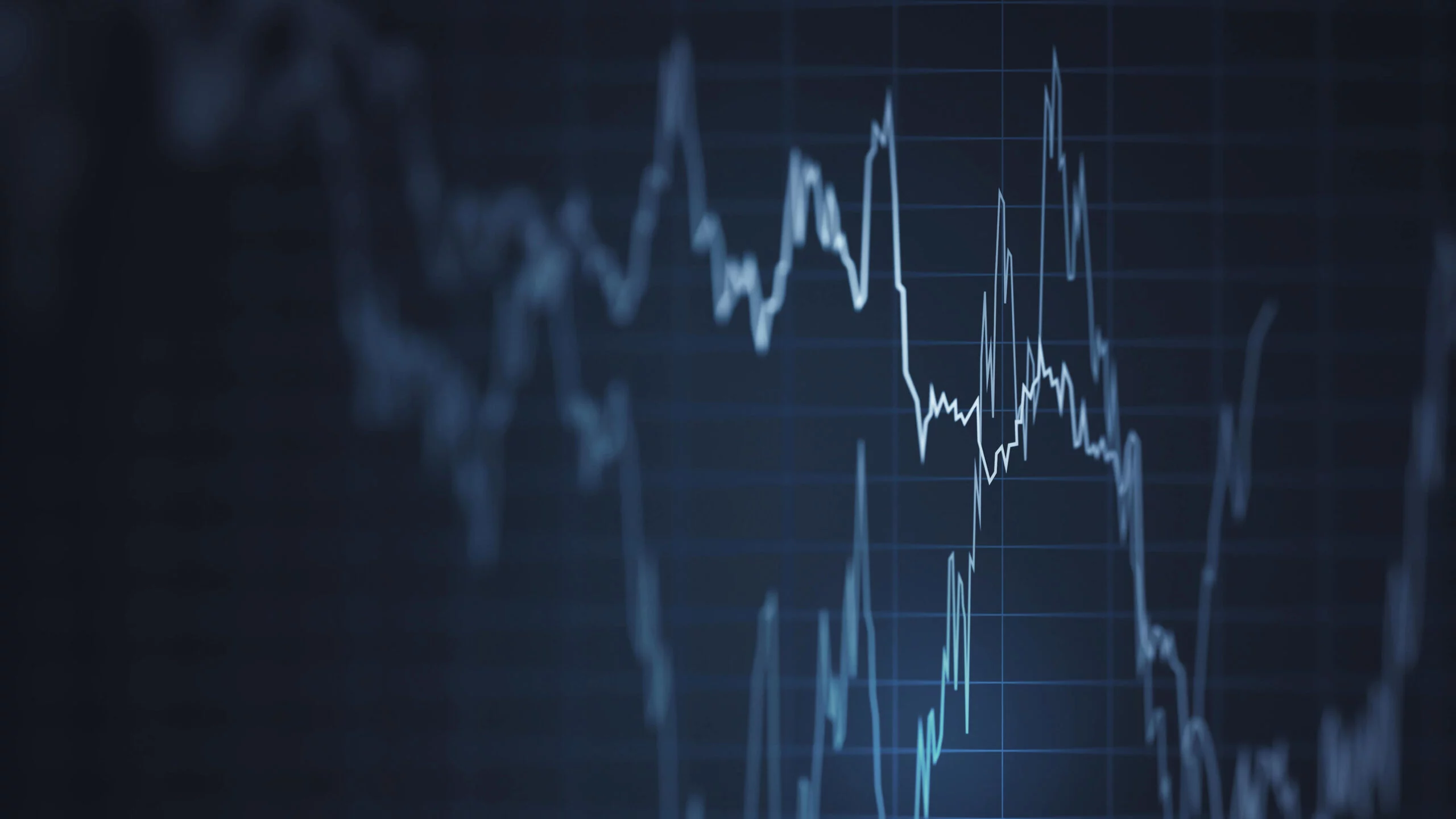 A fluctuating line graph on a dark background