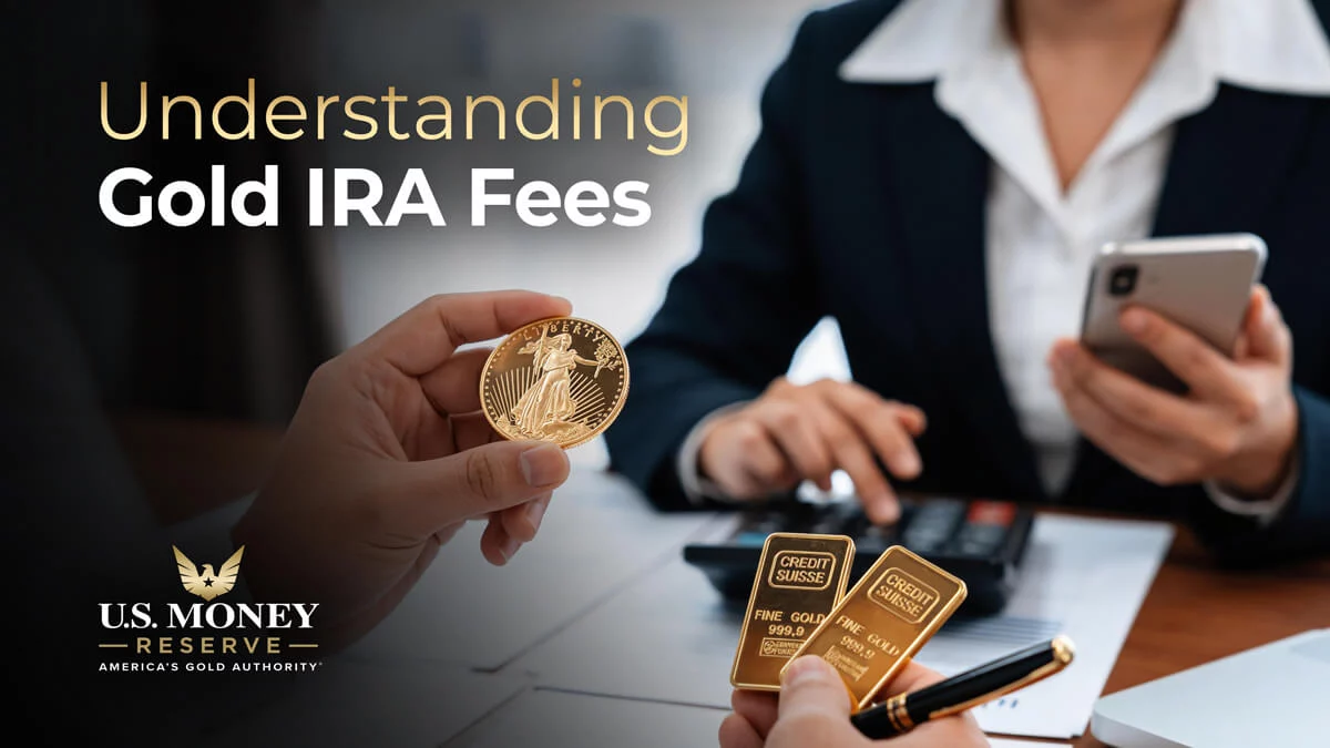 Image of two people sitting in a desk with papers for the understanding gold ira fees (individual retirement account fees)