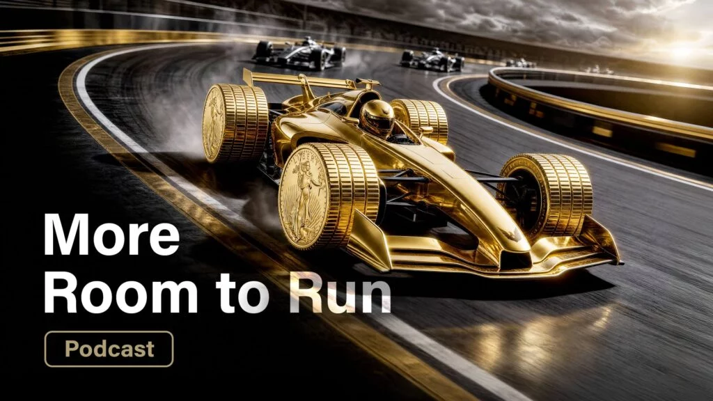 Text “More Room to Run” over image of golden race car with gold coin wheels on track